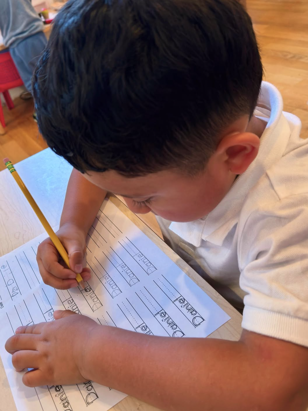 Child practicing early writing